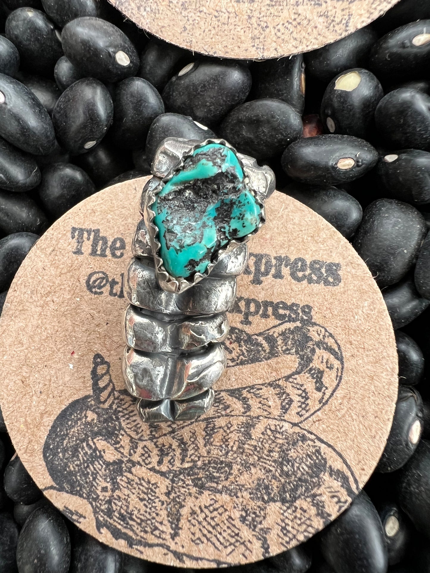 Solid Cast Rattle Pendant With Turquoise Nugget
