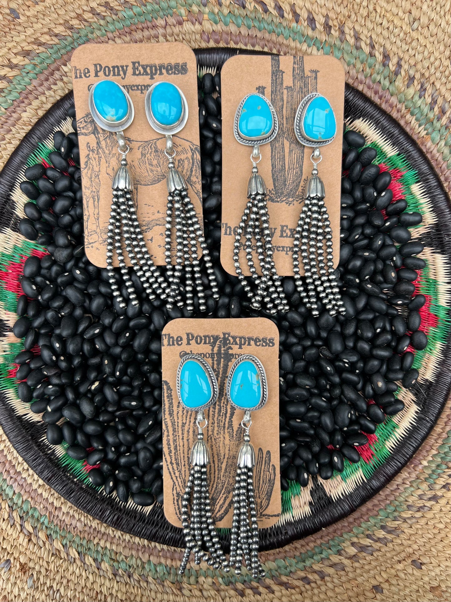 Turquoise Post with silver tassels